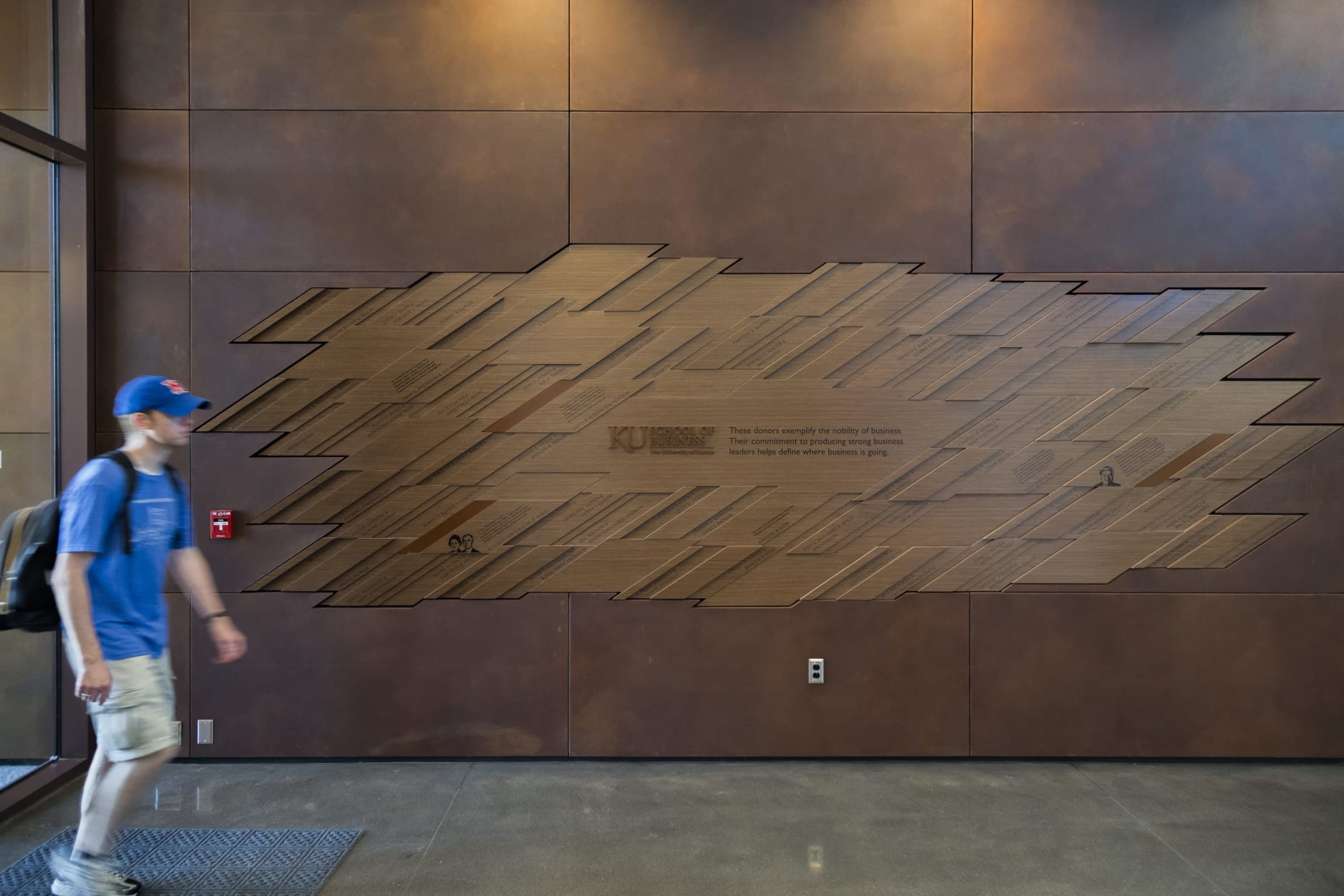 Solanum weathering steel artwall in the entryway of Capitol Federal Hall at the University of Kansas.