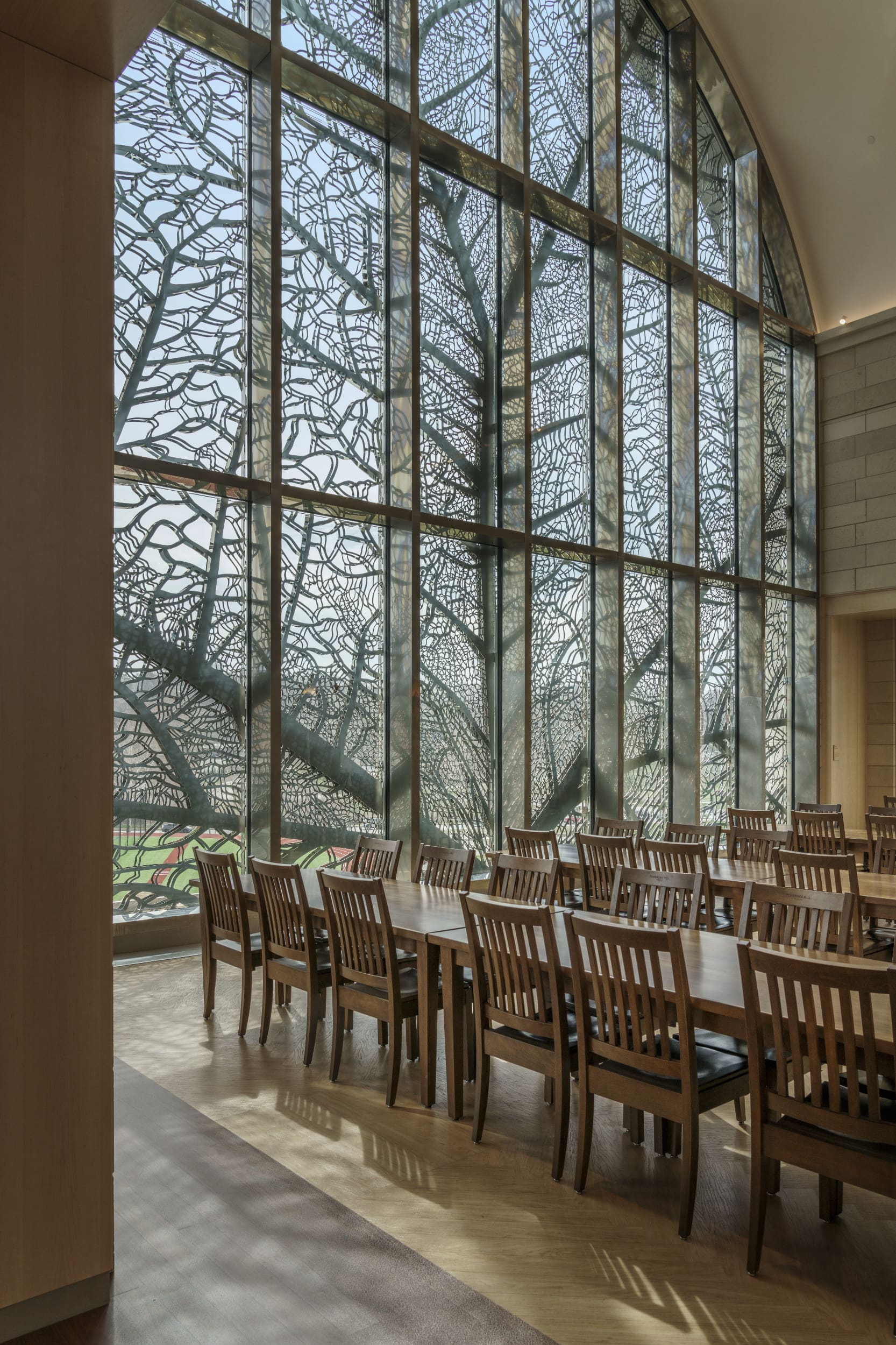 Interior view of the Pembroke Hill dining hall and Jan Hendrix window installation.