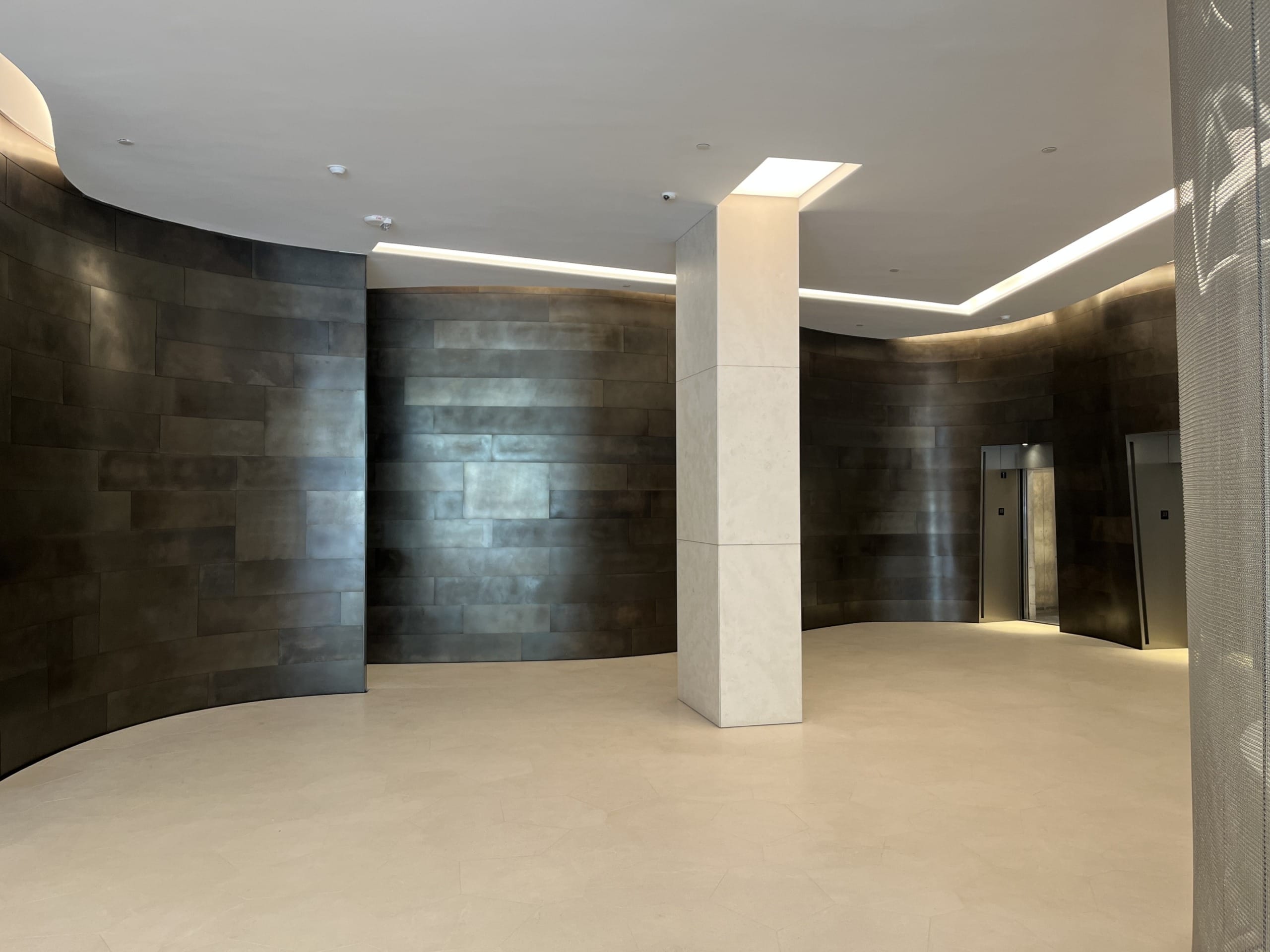 THE EARTH-TONED FINISH WAS PRODUCED VIA PATINATION ON PURE ZINC.