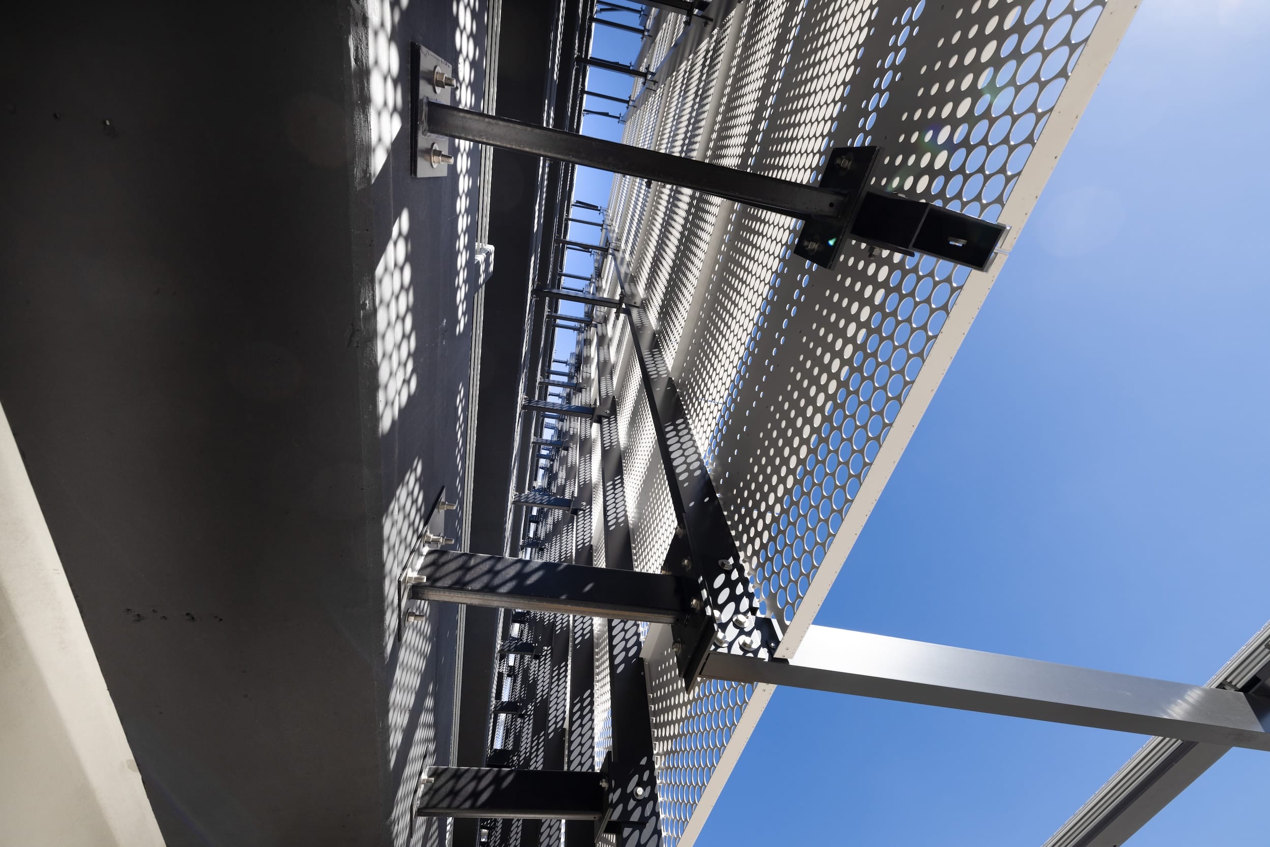 Detail view of facade mounting hardware on Mount Sinai's Parking Garage