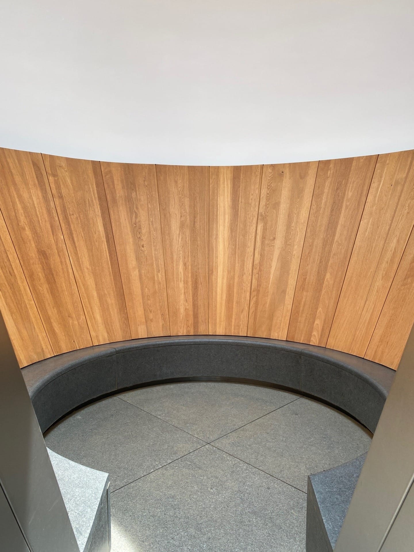 1 A custom-designed teak and stone bench by Castilleja Furniture and Objects provides seating inside the sphere.