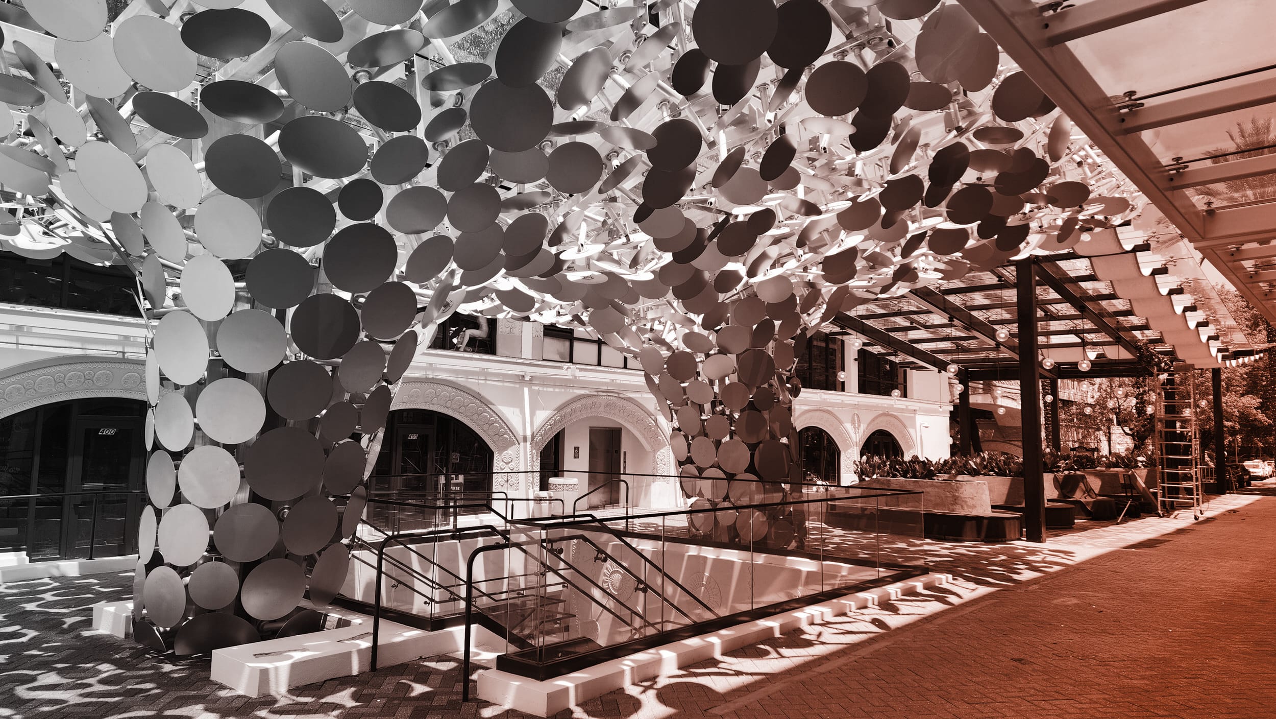 Sculptural canopy for Mayfair at the Grove in Miami, designed by Zahner and Gensler in Angel Hair® stainless steel.